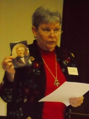 Gale Spock shows photo of her ancestor